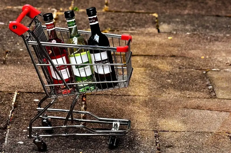 bottles of alcohol in a cart